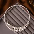 Detail view of French retro irregular cross pearl necklace on grey velvet tray - Necklace-Vintage Double Layer Cross Pearl / White