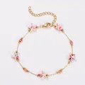 Modisches Edelstahl-Goldkettenarmband mit bunten Seesternen und Perlen-Anhängern - Armband / Orange-Rosa Gemischt