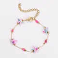 Süßes buntes Seestern Armband mit goldenen Edelstahlperlen und feiner Gliederkette - Armband / Rosa Blau Gemischt