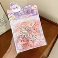 Detail view of colorful disposable hair rubber bands in a cute bunny package - 400 Pieces/Pack / Pink-Blue-White