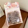 Detailed view of a large pack of elastic hair bands in multi-color neutral earth tones - 400 Pieces/Pack / Brown