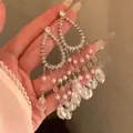 Elegante lange kwastoorbellen in Franse stijl met imitatieparels en fonkelende strasstenen - Waterdruppel Holle Parel Kwast Stijl (31#)