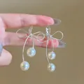 Elegante zilveren strik oorbellen met hangende witte parels voor dames - Fijne Ketting Strik Kunstparel Kwast Stijl (44#)