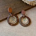 Close-up of handmade retro wooden earrings with intricate dreamcatcher woven detail - 3# Silver Post-Coffee-White