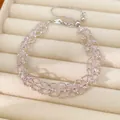 Détail du bracelet en perles de verre roses tissées avec cordon de serrage réglable - Rose