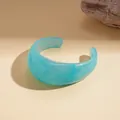 Bold blue marbled resin cuff bracelet with a glossy translucent finish for women - Wide Open Style (48#)