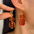 Vintage Maillard stijl bruine amber-achtige ovale oorbellen met gouden afwerking - Goud + Koffie