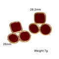 Geometric gold-plated stainless steel stud earrings with red enamel and size markings. - Burgundy