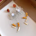 Detail of retro resin marbled flower tassel earrings with white pearls and orange beads - Silver-Coffee-White