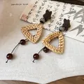 Handmade Bohemian ethnic style woven triangle earrings with brown star and beads - Star Geometric Long Style (HE35759) / Brown