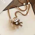 Close-up of a cute plush bear pendant necklace with a brown scarf and long lanyard strap - Cute Bear (AQ430) / Coffee Cord / Beige