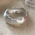 Elegant matte silver textured wavy bangle bracelet with minimalist geometric design - Wrinkled Wave Style