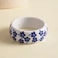 Elegant white resin bangle with blue floral pattern in blue and white porcelain style. - Floral Print / Blue & White