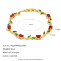 Vue détaillée d'un bracelet plaqué or 18 carats avec feuilles de muguet rouges et vertes - Rouge Vert Patchwork