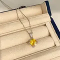 Collier élégant en argent avec un pendentif brillant en zircon jaune en forme de losange. - Collier / Jaune