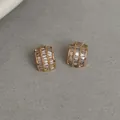 Elegante vergoldete Halbring-Ohrstecker mit schimmernden Baguette-Zirkonia-Steinen. - Stil mit Silber-Ohrstecker / Gold