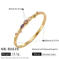 Detail showing measurements and materials of the gold stainless steel stone-inlaid bangle - Twisted Rope Geometric Rhinestone Style (NB-B6639) / 18K Gold