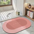 Non-slip absorbent pink diatom mud bathroom floor mat featuring minimalist HOME text design - 40*60cm / Oval / Plum Pink