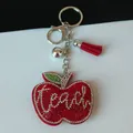 Porte-clés pomme en strass rouge étincelant avec pompon rouge et fermoir mousqueton argenté - Porte-clés + Pendentif en Strass / Pomme