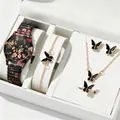 Close-up detail of a floral print quartz watch and black butterfly jewelry set - Floral Print