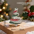 Silver tone Christmas tree brooch with red and green rhinestones on festive snow - Christmas Tree - Pavé(113)