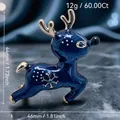 Dark blue enamel Christmas reindeer brooch with snowflake detail and gold accents - Dark Blue Reindeer(96)