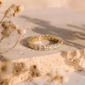 Elegant gold-plated eternity ring featuring sparkling D-color round-cut moissanite stones. - US Size 4.5 / Eternal Moissanite Full Eternity Ring / Gold