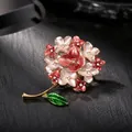 Close-up of elegant hydrangea enamel brooch with sparkling rhinestone accents - Red