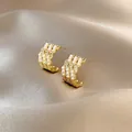 Elegant C-shaped earrings with rows of small white pearls and crystals on gold finish - C-Shaped Artificial Pearl Micro-Inlaid Style (E4184)