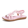 Elegant Bohemian pink flat sandals featuring floral decorations and cross straps for women - 36 / Pink