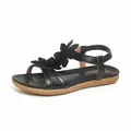 Elegant black Bohemian flat sandals for women with flower decoration and cross straps - Black