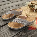 Stylish grey wedge flip-flops with 3D floral accents and comfortable 5.5cm heel height - 36 / Gray