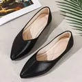 Elegant black pointed-toe ballet flats with textured finish and stylish V-cut design - 35 / Black