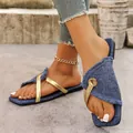 Chic denim flat sandals featuring metallic gold cross straps and square toe design. - 36 / Blue