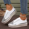 Close-up view of elegant white fashion sneakers with silver rhinestone details on deck - 36 / Retro Running Style (128060) / White
