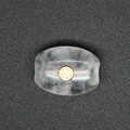 Macro view of natural strawberry quartz bead with gold zircon inlay and large hole. - White Crystal