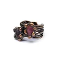 Macro view of a vintage bronze open ring set with natural raw reddish-purple crystals - Style 1