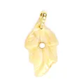 Detailed view of a small natural stone leaf pendant with sparkling zircon inlay. - Topaz