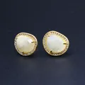Detail view of baroque gold-plated stud earrings with sunstone and micro-pave crystals - Moonstone
