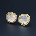 Detail of faceted rose quartz stud earrings with micro-paved crystals and gold plating - Rose Quartz