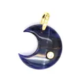 Macro view of blue natural stone crescent moon pendant with gold-plated zircon setting details - Blue Sodalite