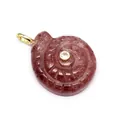 Detail of hand-carved natural stone snail pendant with zircon accent - Strawberry Quartz