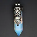 Macro view of vintage carved silver cap on opalite hexagonal point pendant - Opal