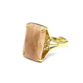 Macro detail of a rectangular faceted sunstone set in an elegant gold adjustable ring - Sunstone