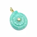 Close-up of a teal natural stone spiral shell pendant with central zircon detail. - Amazonite