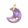 Close-up of natural amethyst crescent moon pendant with sparkling zircon accents. - Amethyst