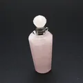 Macro detail view of pink natural rose quartz stone perfume bottle pendant jewelry - Rose Quartz / Silver
