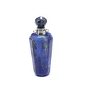 Macro detail view of a faceted natural lapis lazuli perfume bottle pendant necklace - Lapis Lazuli / Silver