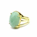 Close-up of vintage gold adjustable ring featuring a large faceted oval amazonite stone. - Aventurine Jade