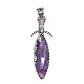 Close-up of a vintage silver sword pendant with a large purple marquise amethyst stone. - Amethyst